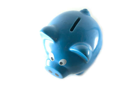 Blue piggy bank, isolated on whiteの写真素材
