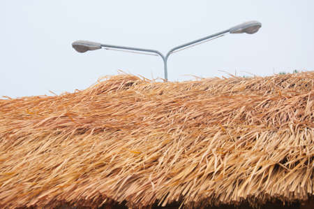 Thatched roof at the hut in the countrysideの写真素材