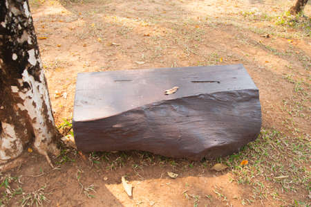 Stone bench in gardenの写真素材