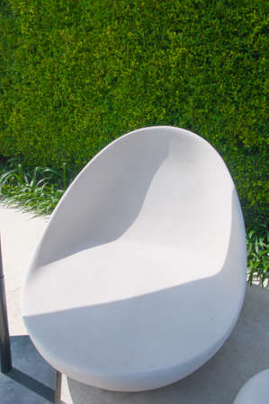Stone chair in swimming poolの写真素材