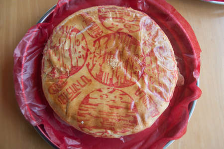 chinese pastry in plate on wood tableの写真素材
