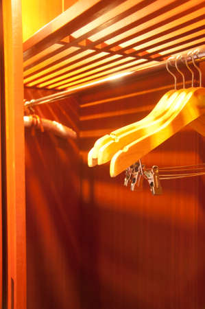 clothing hanger in the brown woodenの写真素材