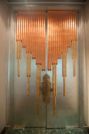 Big wooden door in hotelのeditorial素材