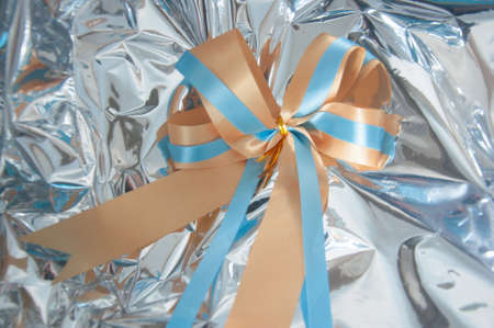 ribbon bow on silver background