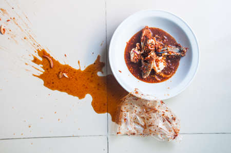 Spilled in table : Famous Thai food, "Yum poo ma" spicy salad with fresh horse crabの写真素材