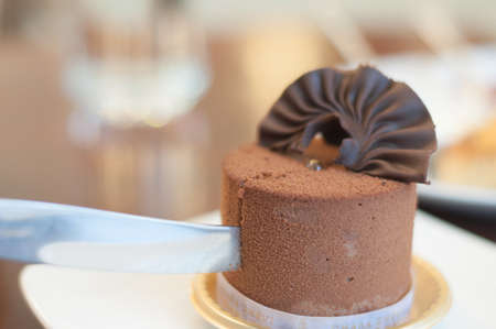 eating of chocolate cake in coffee shop