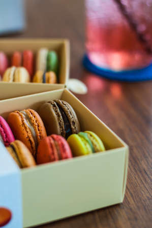 the colorful macaroons in boxの写真素材