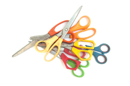 Many of scissors on white background