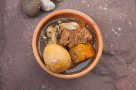 Thai traditional food made from soft-centered eggs, pork leg and some spice.Khaipaloの写真素材
