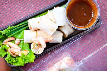 Vietnamese pork and crab spring roll with sauce - Asian style foodの写真素材