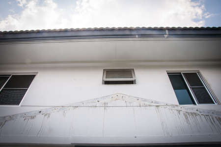 The roof of the house with windowの写真素材