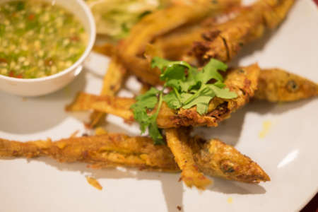 fried Fish with chili sauceの写真素材