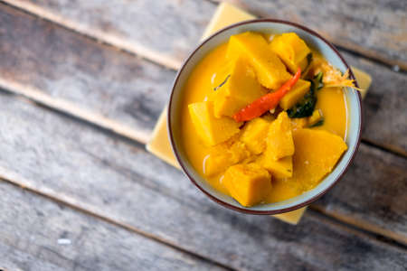 Thai hot and spicy soup with shrimp and pumpkinの写真素材