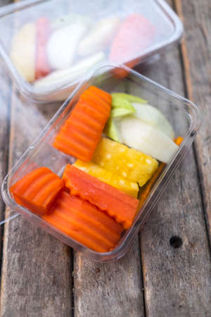 healthy food : ripe papaya, guava and pineapple in plastic boxの写真素材
