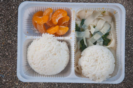 Ready to eat asian rice box full of Thai food