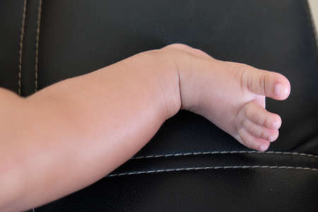 Cute tiny little baby feetの写真素材