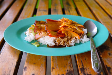Crispy roasted belly pork chinese style and riceの写真素材