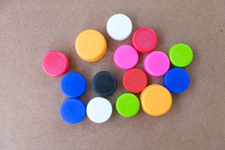 Colorful plastic bottle screw caps used to seal plastic bottlesの写真素材