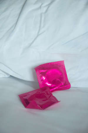 condom on bed - sexy set upの写真素材