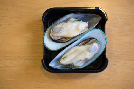 fresh mussel preparing for sukiyaki hot pot