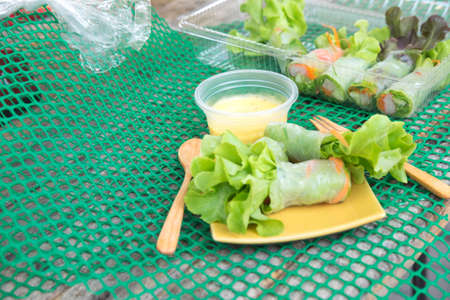 Salad roll vegetables with salad dressing