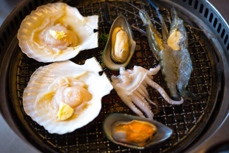 Grilled seafood set with shrimp, squid, scallopの写真素材