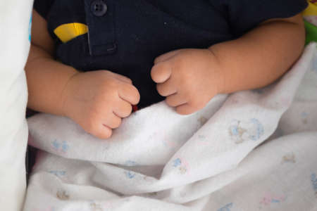 tiny baby hands,very cuteの写真素材