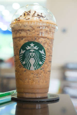 Samutprakarn, Thailand - May 21, 2016: Glass of Starbuck coffee ice cappuccino blended beverages served on table at starbucks coffee shop inside Home Pro Village , Suvarnabhumi
shopping mallのeditorial素材