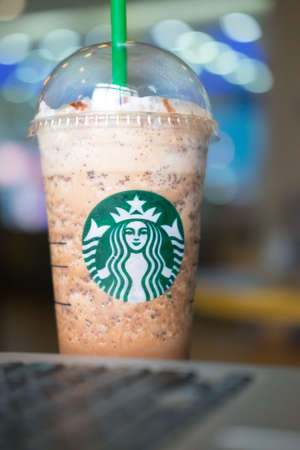 Samutprakarn, Thailand - May 21, 2016: A Java Chip Coffee Frappuccino Starbucks Coffee is an American coffee chain with shops all over the world.のeditorial素材