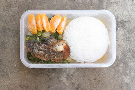 Thai package lunch to go on stone background
