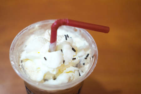 Ice coffee with whipped creamの写真素材