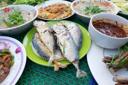 Fried Mackerel fish,chili sauce ,and fried vegetable, Thai foodの写真素材