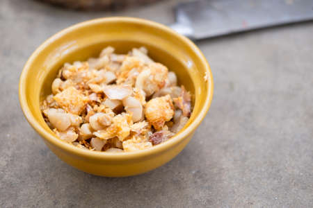 Thai pork snack made of deep fried pork skin in ceramic bowlの写真素材
