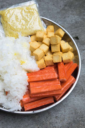 Hot Pot Ingredients tremella, fish tofu and crab sticks for Sukiyakiの写真素材