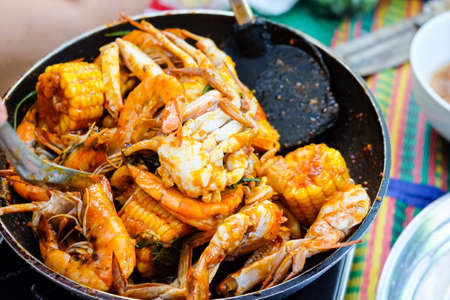 Fried shrimp ,squid and crab with basil with hot and spicy sour, menu enjoy with rice good for...