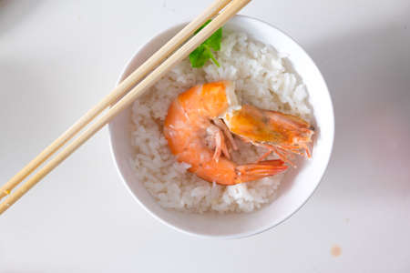 rice with boiled shrimp in bowlの写真素材