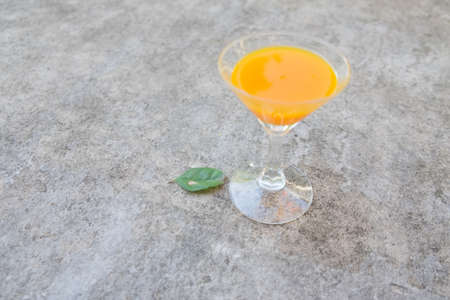 Freshly orange juice (Selective Focus, Focus the glass)の写真素材