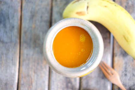 breakfast, orange juice and banana, top viewの写真素材