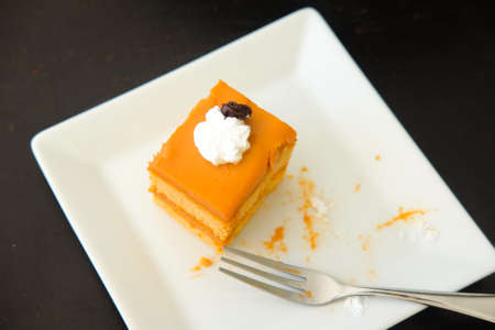 Thai tea layer cake with mold, eating