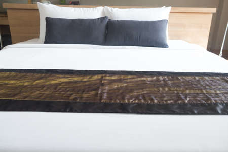 Double bed in hotel room in hotel bedの写真素材