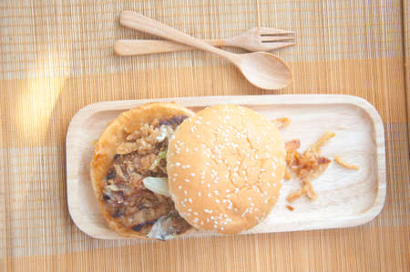 Classic American burger fast food in wood trayの写真素材