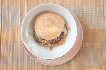 Hamburgers fast food on wood tray, unhealthy foodの写真素材
