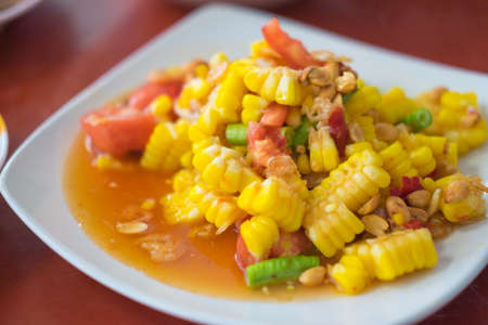 Famous Thai food, papaya salad with corn it call "Somtum Thai Khao Phod", Selective focusの写真素材