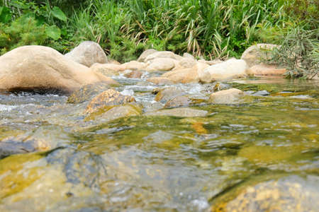 small stream over rocks  in Khiriwong Sichon ,Nakhon Si Thammarat, Thailandの写真素材