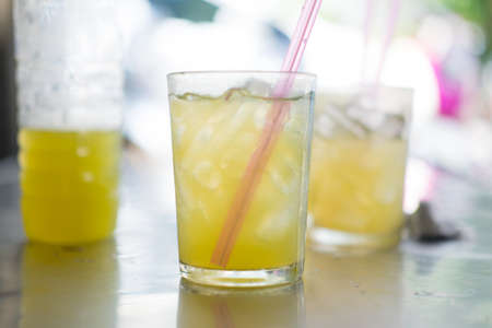 Freshly squeezed sugar cane juice in glassの写真素材