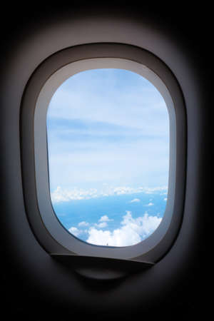 Clouds in the aircraft's portholeの写真素材