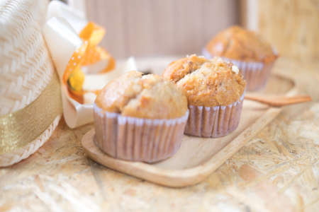 Healthy vegan banana muffins in wood pan. Selective focusの写真素材
