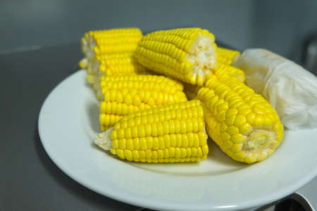 Sweet corns on white dishの写真素材