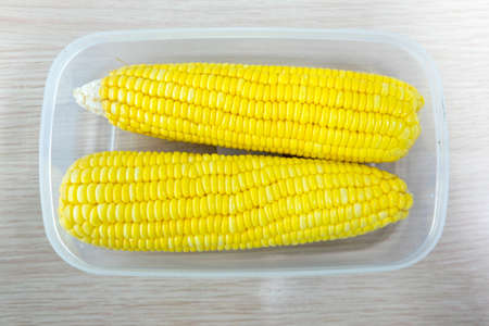 Sweet corns in box, raw cornsの写真素材