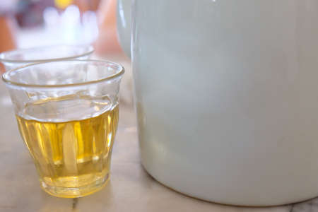 cup of hot tea on table
